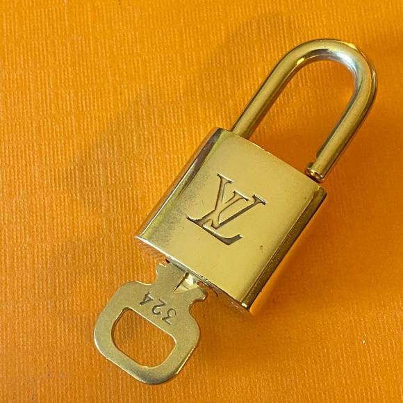 Louis Vuitton Handbags - Louis Vuitton brass lock set with key #324 Authentic padlock NICE!